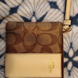 Coach Brown Signature Canvas and Cream Leather Wristlet